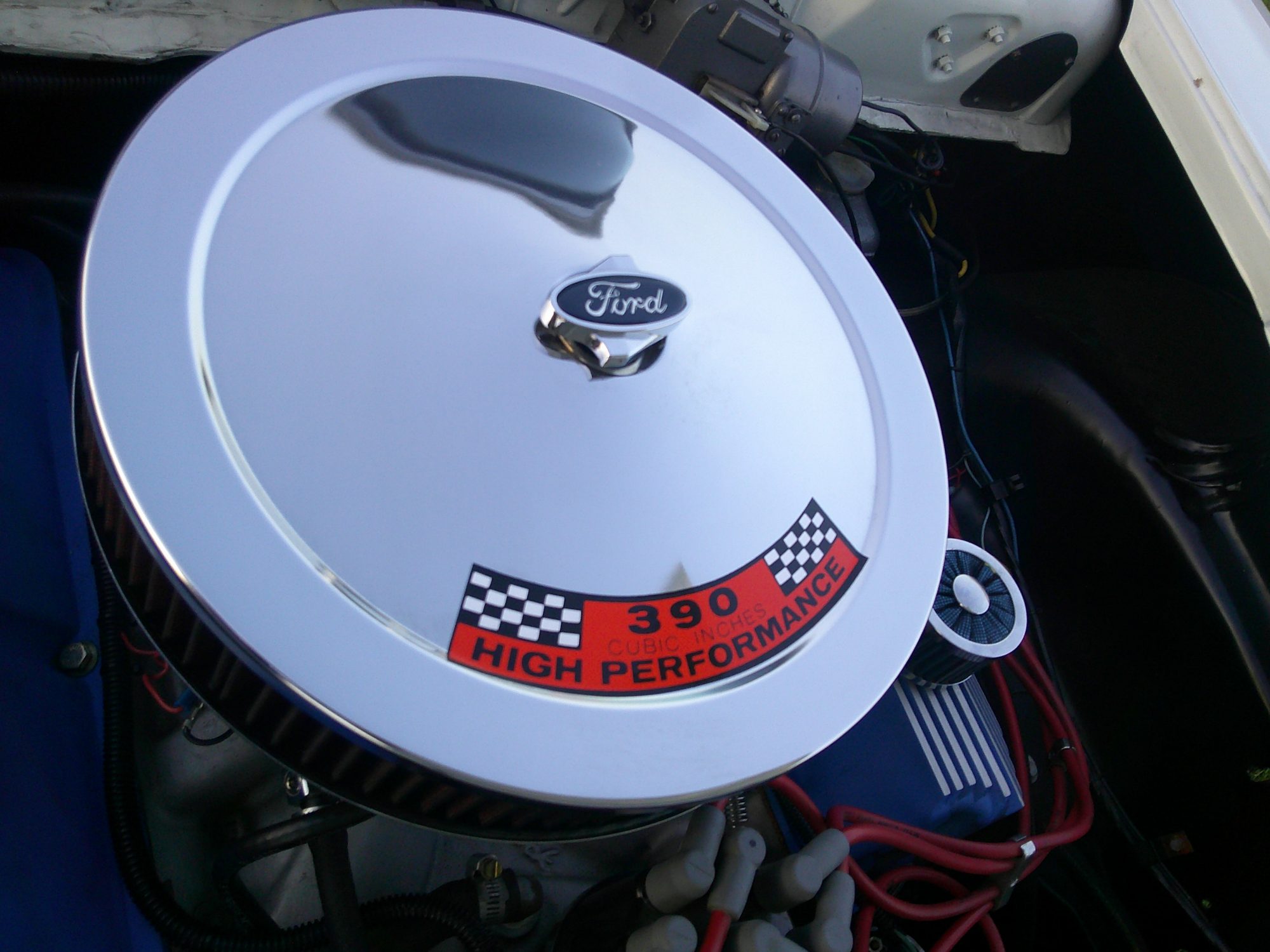 Chrome air cleaner lid on a Ford 390 cubic inch High Performance engine.