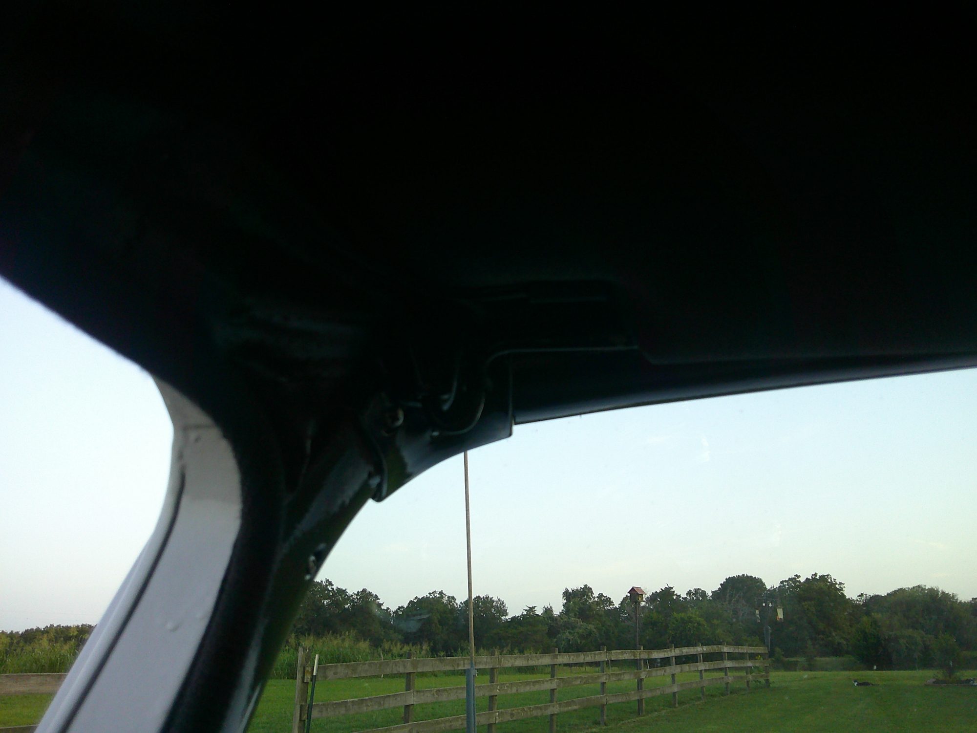 View of the upper interior trim and window seal pillar.