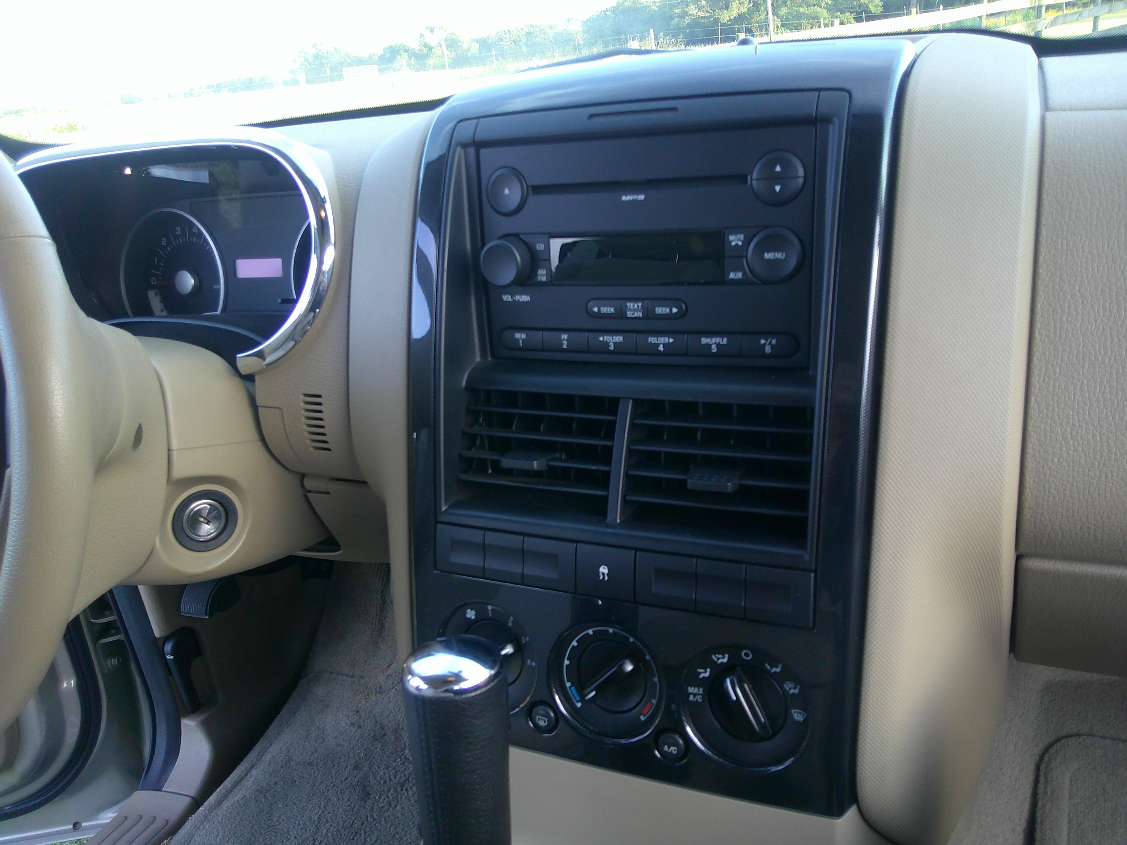 Center console with radio unit and climate controls.