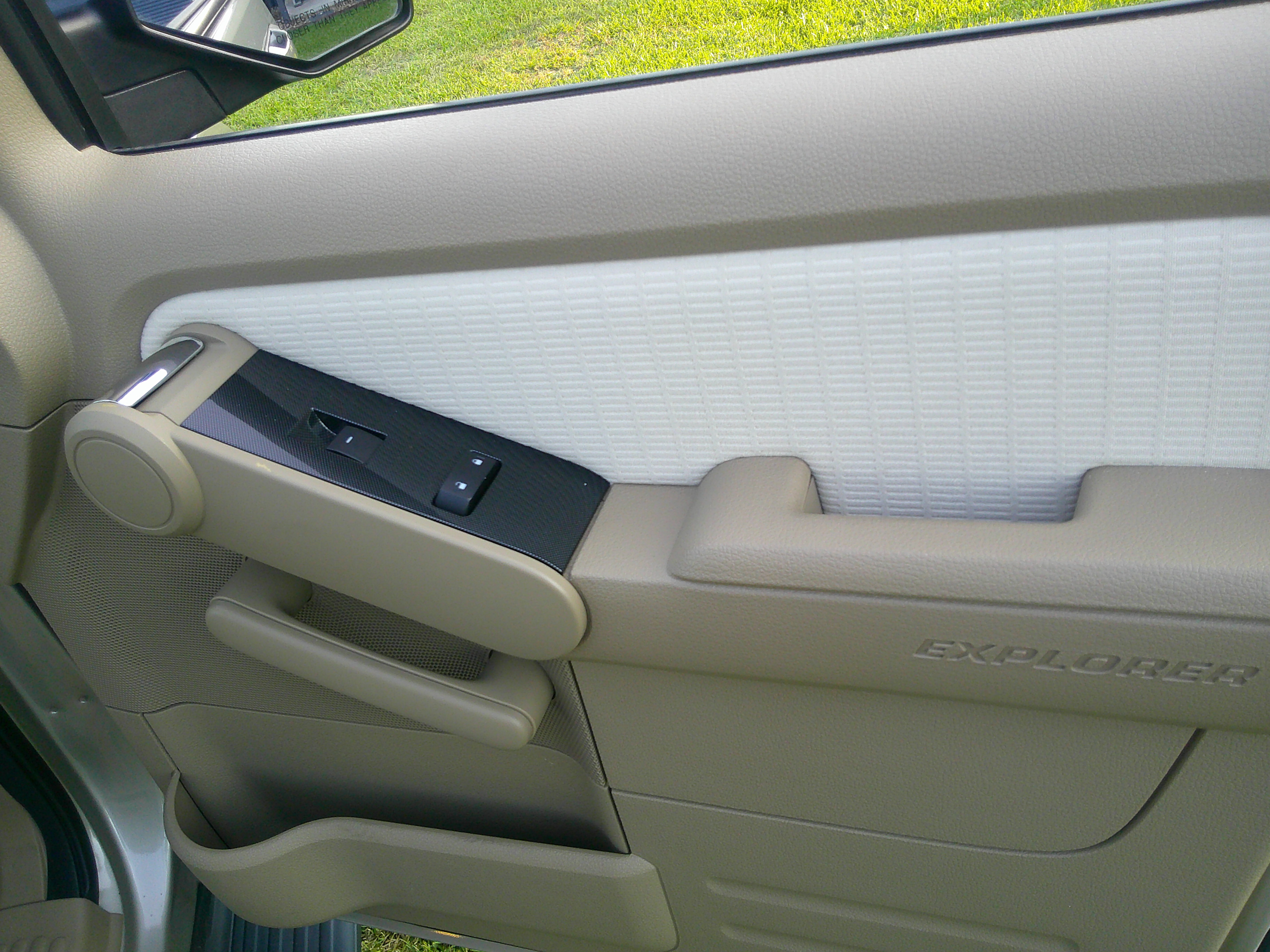 Passenger side door panel with power lock and window controls