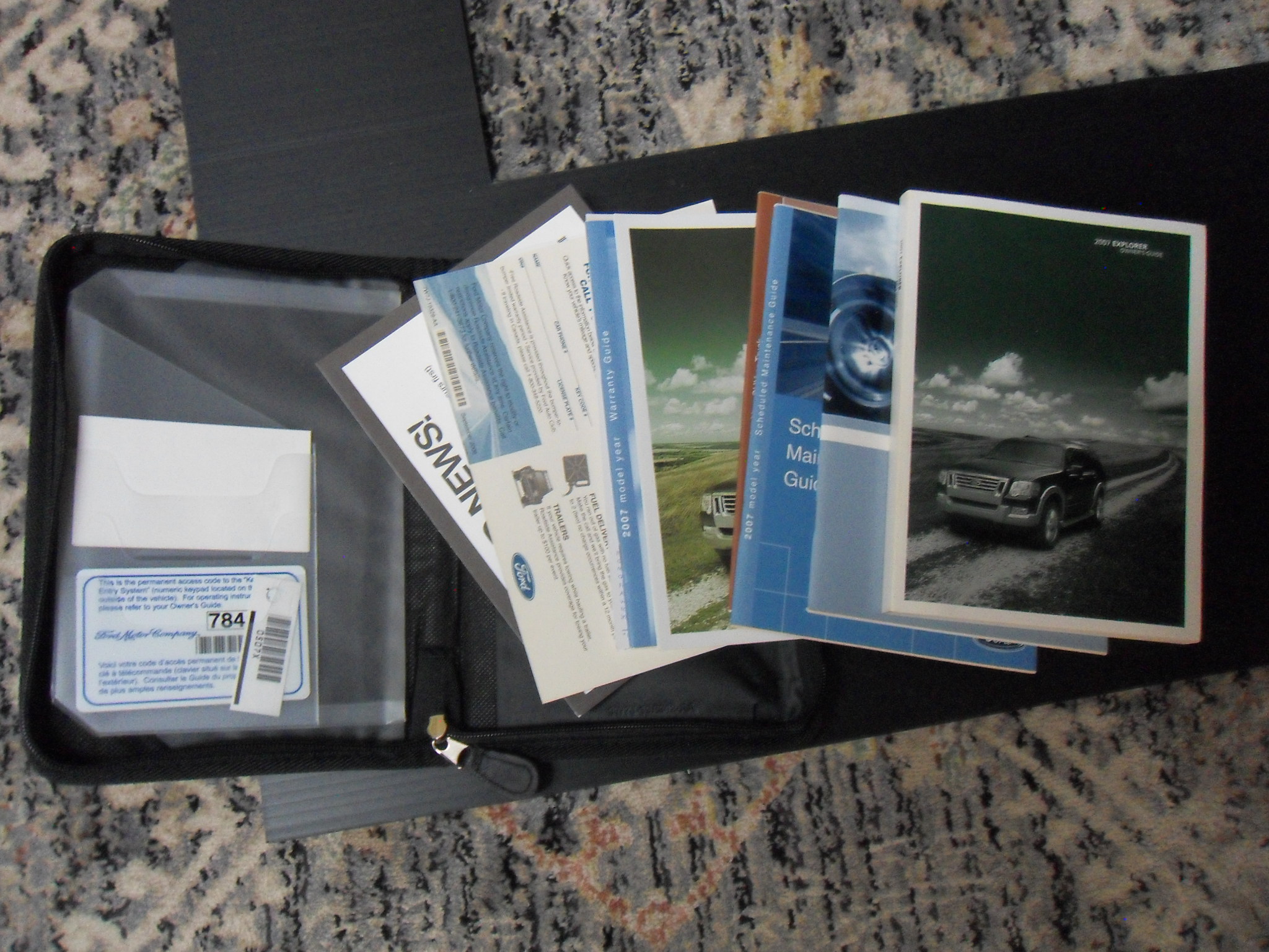 Vehicle owner's manuals and documentation in original pouch