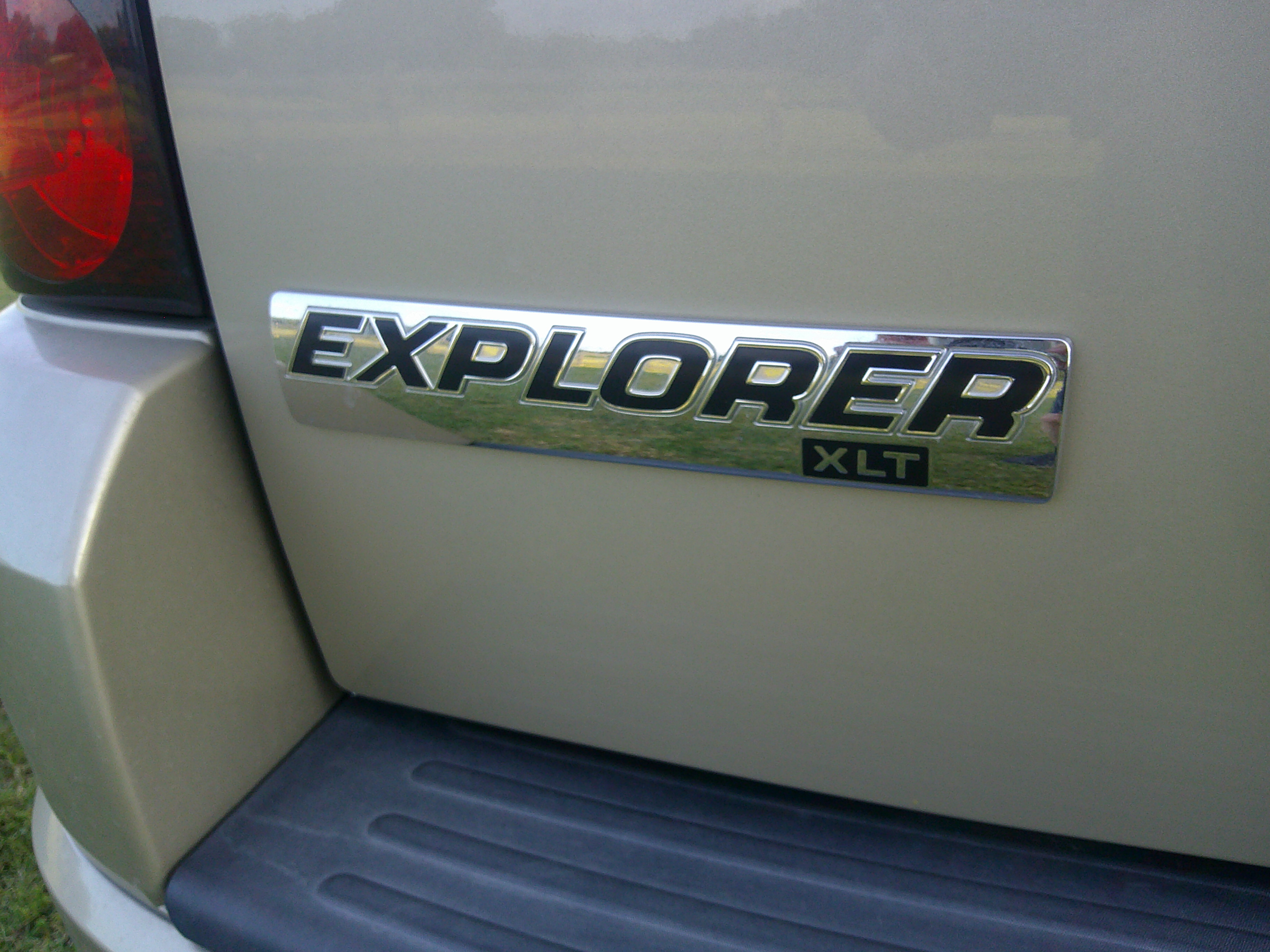 Rear Explorer XLT chrome emblem on liftgate.