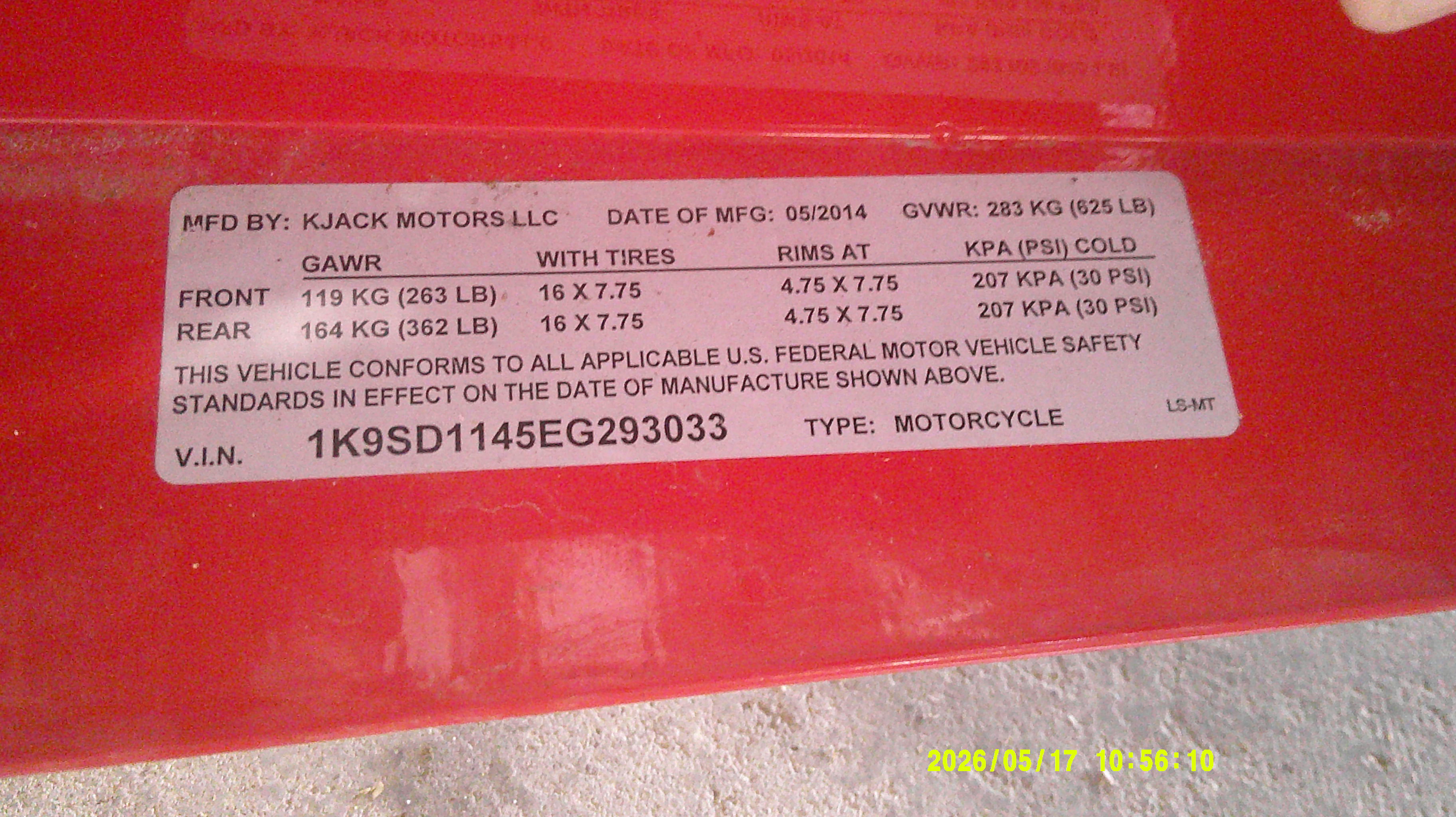Manufacturer identification label showing VIN and weight specifications
