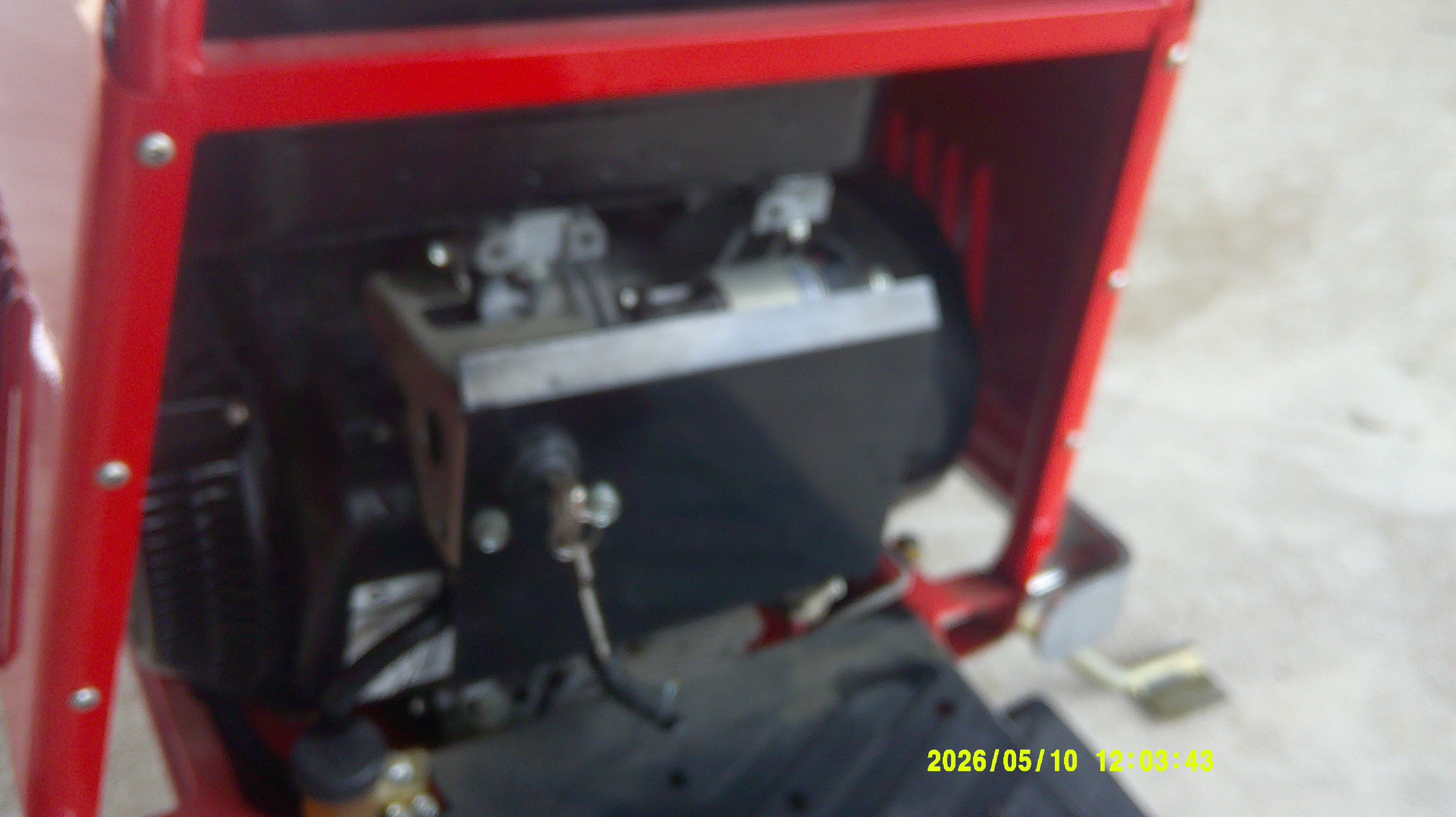 Under-hood view of the engine components and mechanical assembly.