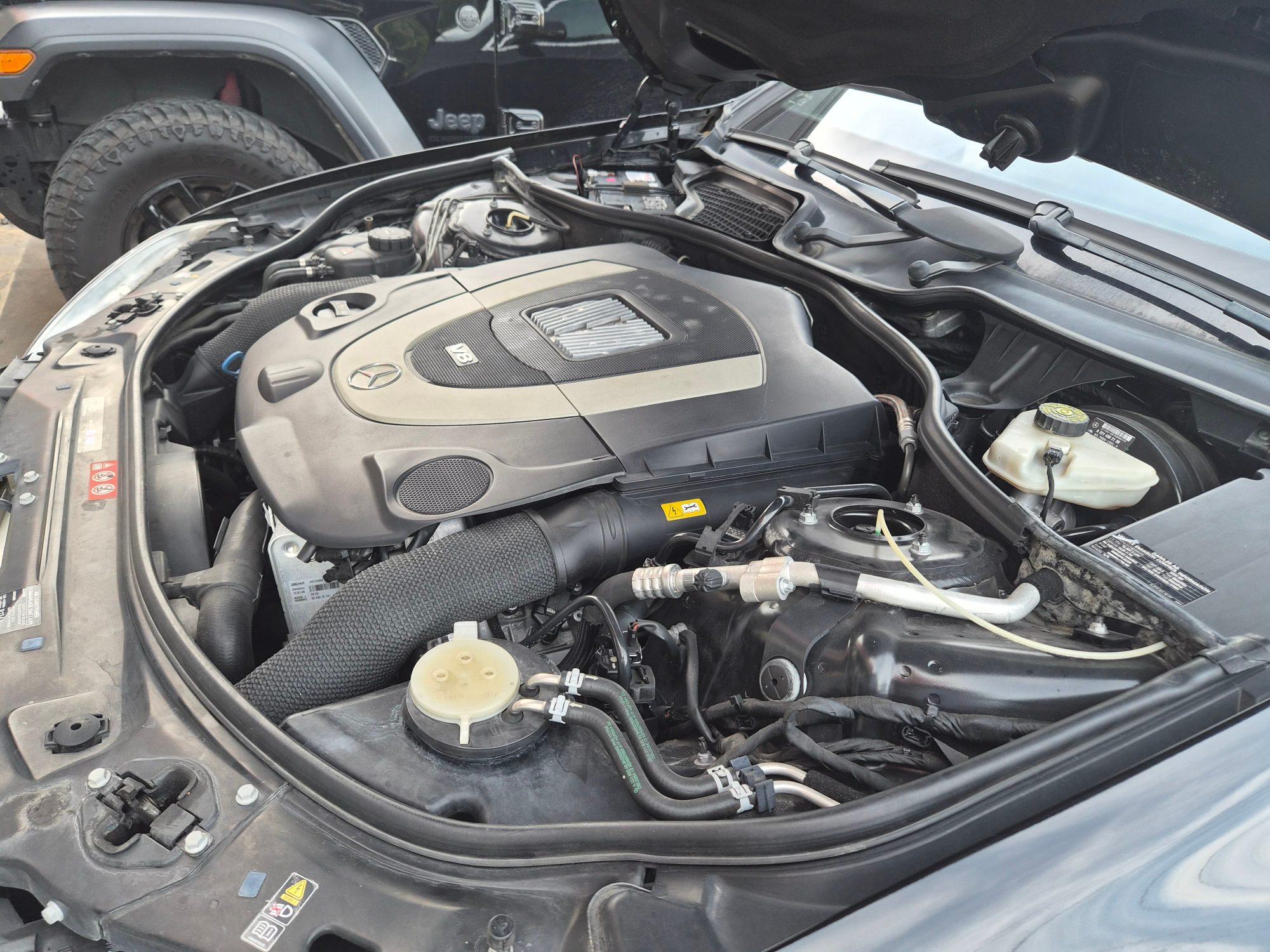 Mercedes-Benz V8 engine bay with cover installed