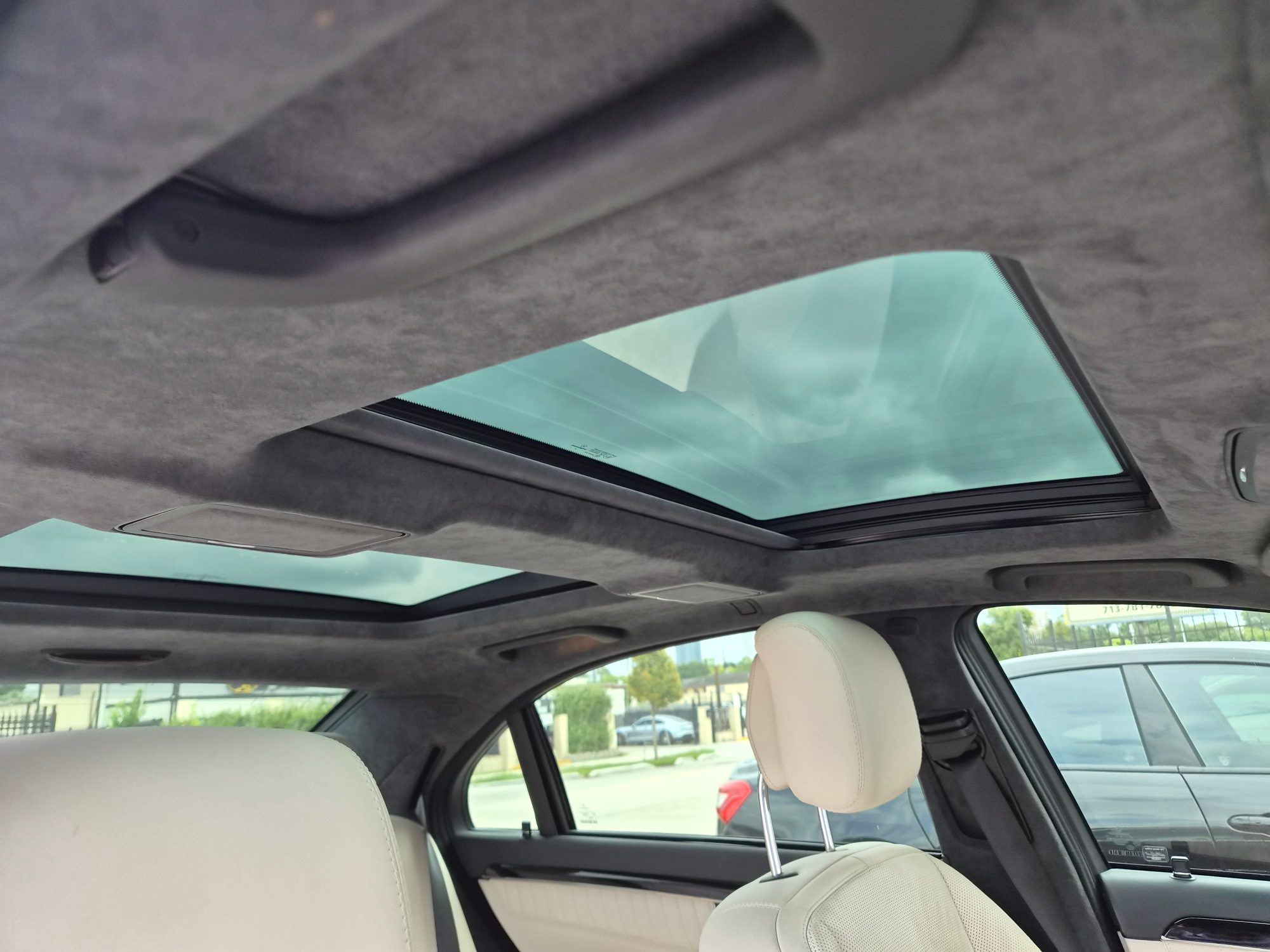 View of the dual-pane panoramic sunroof and Alcantara headliner.