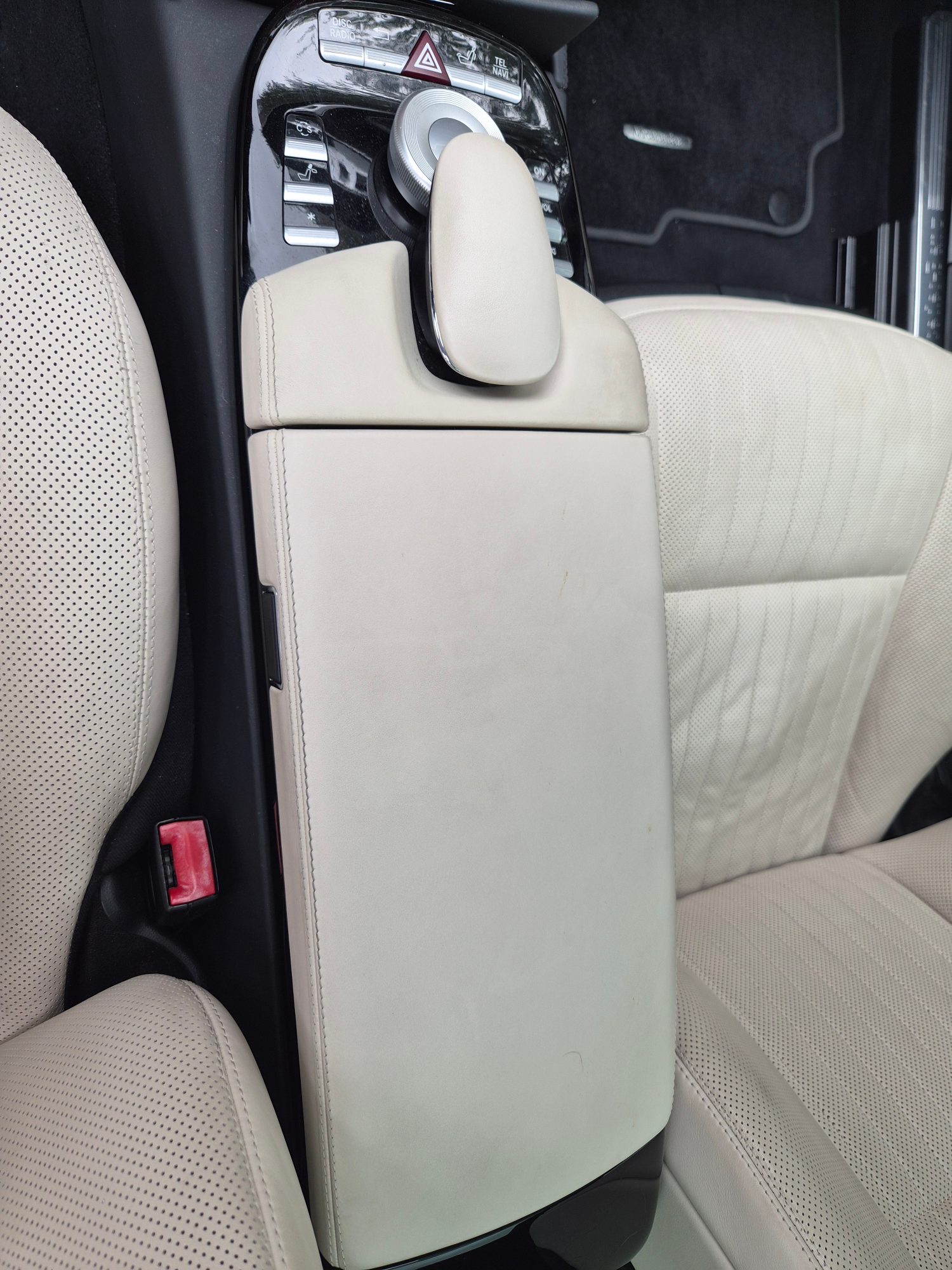 Center console armrest and perforated leather seats