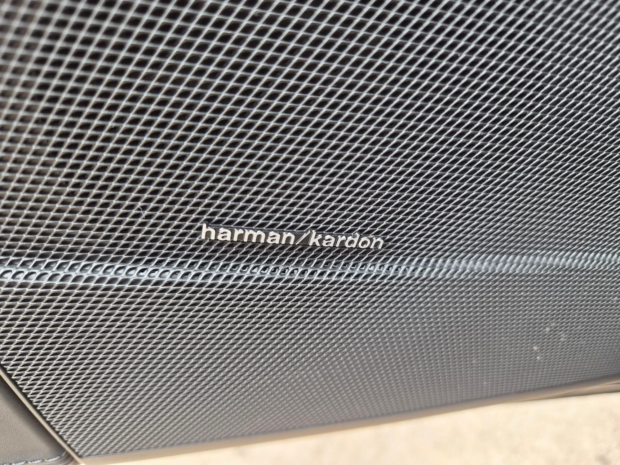 Close-up of Harman Kardon speaker grille