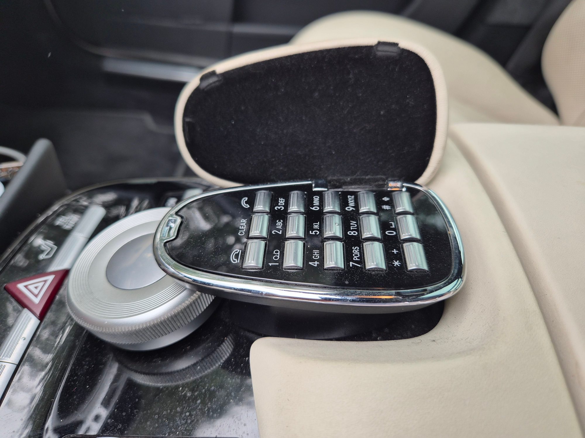 Center console phone keypad and infotainment controller dial.