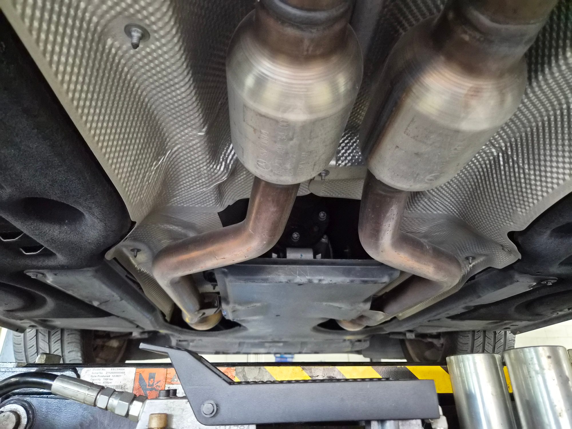 Underbody view of dual exhaust system and heat shields