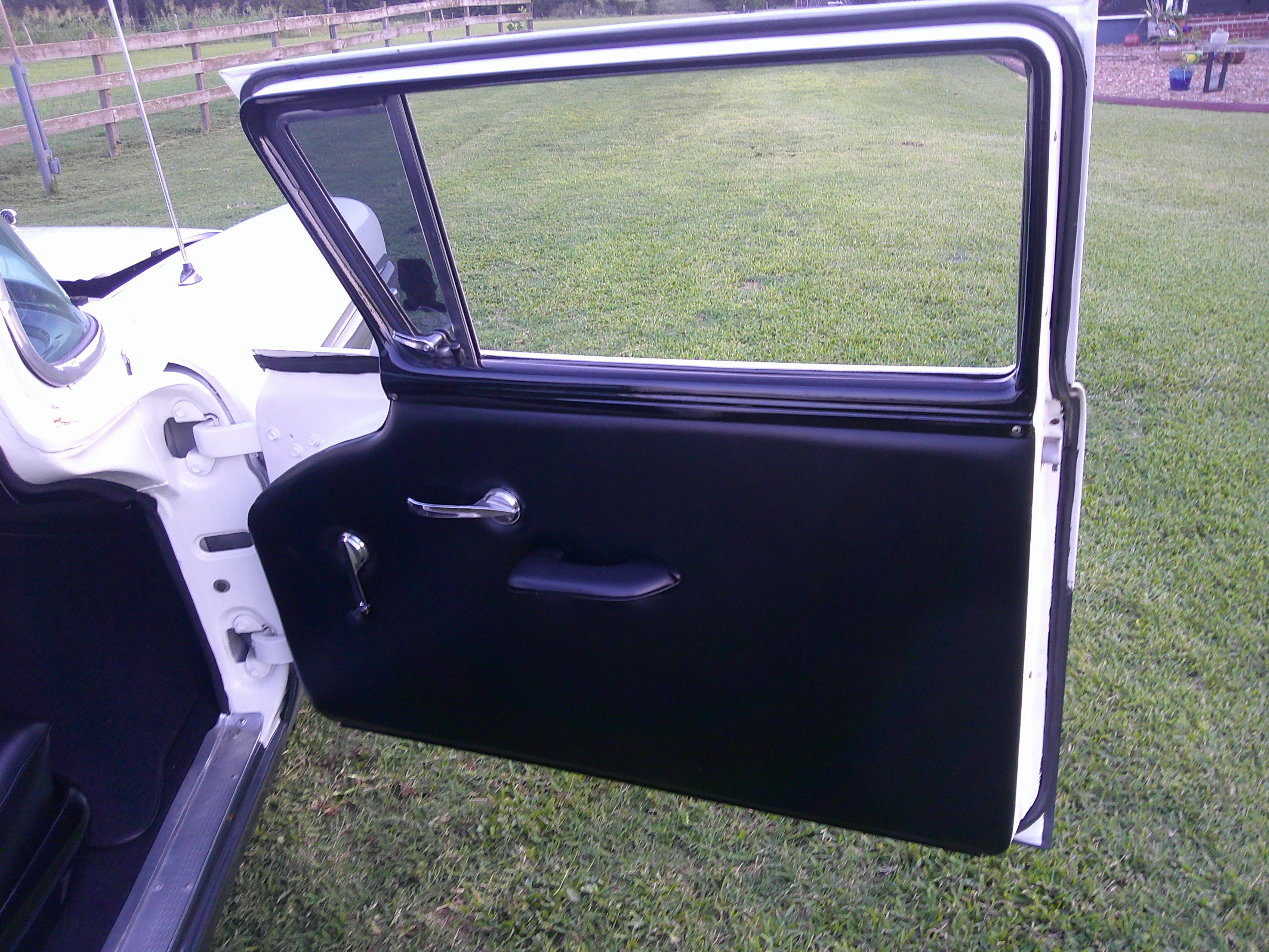 Driver side interior door panel and window frame.