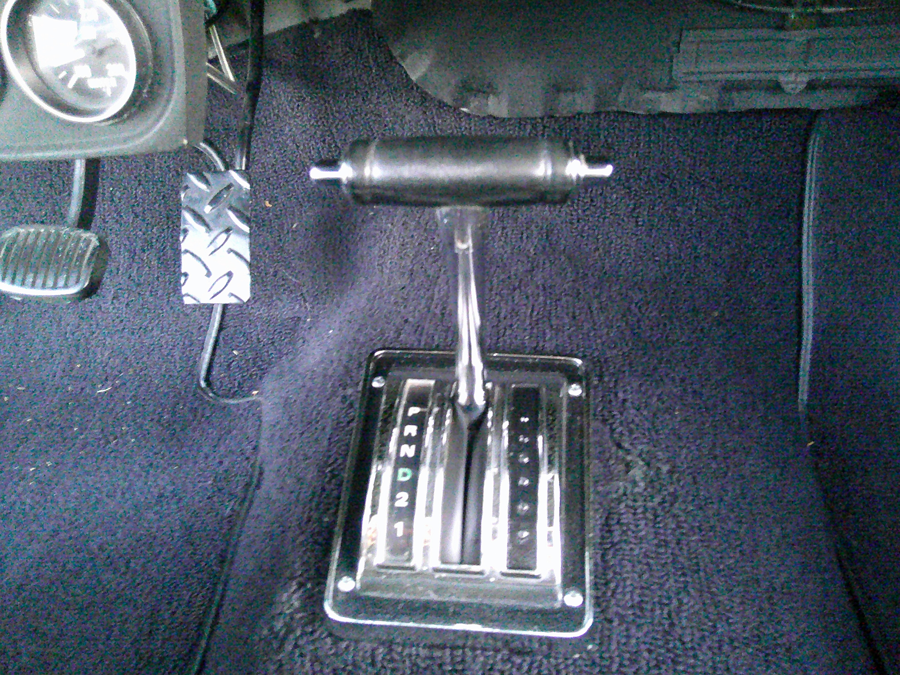 T-handle automatic floor shifter and interior carpeting