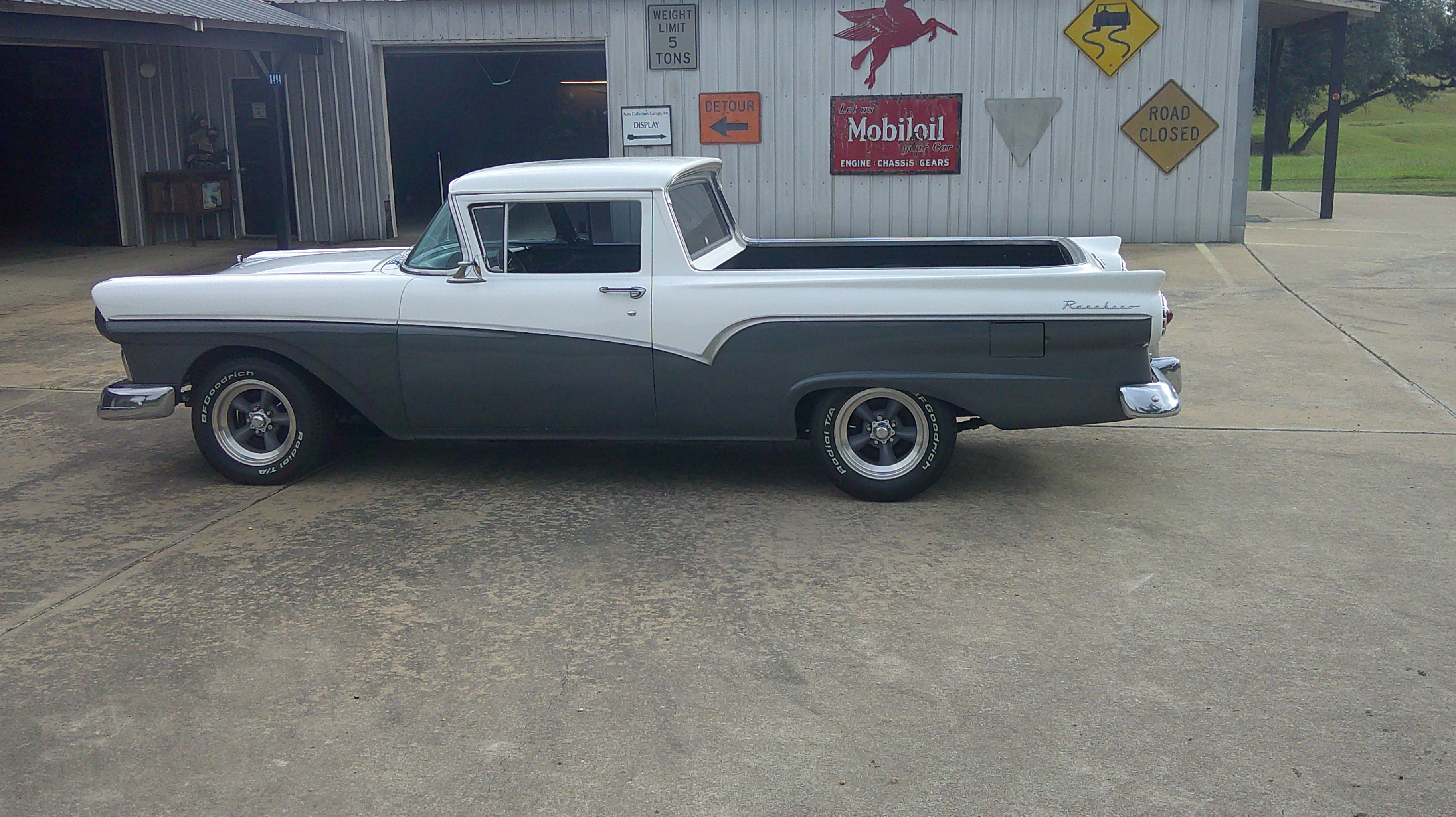 Side profile of a two-tone white and gray Ford Ranchero.