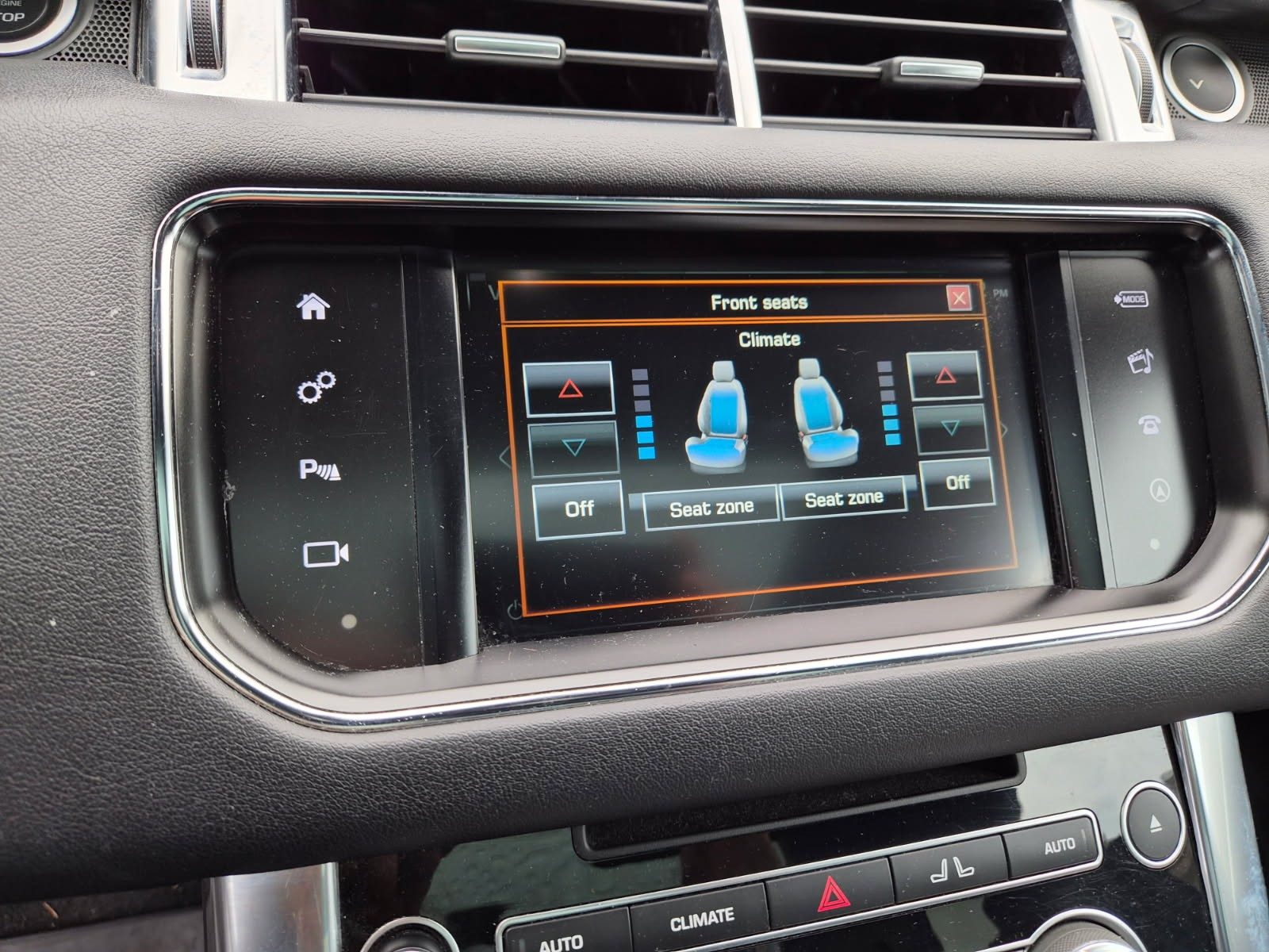 Center infotainment touchscreen showing front seat climate controls