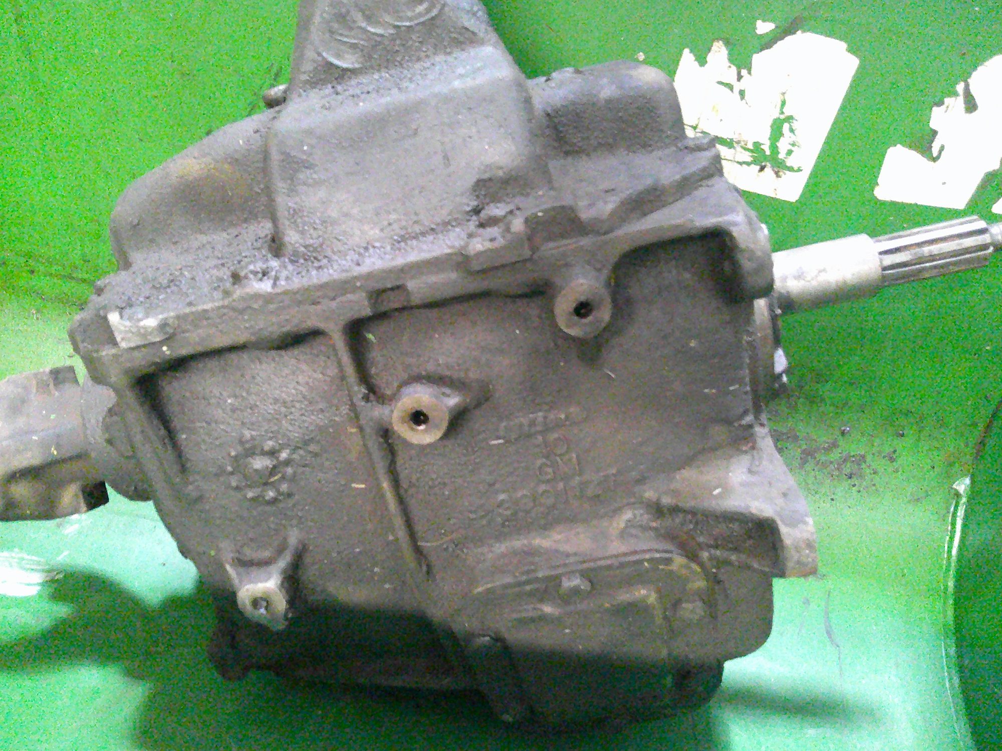 Cast metal transmission housing with splined input shaft