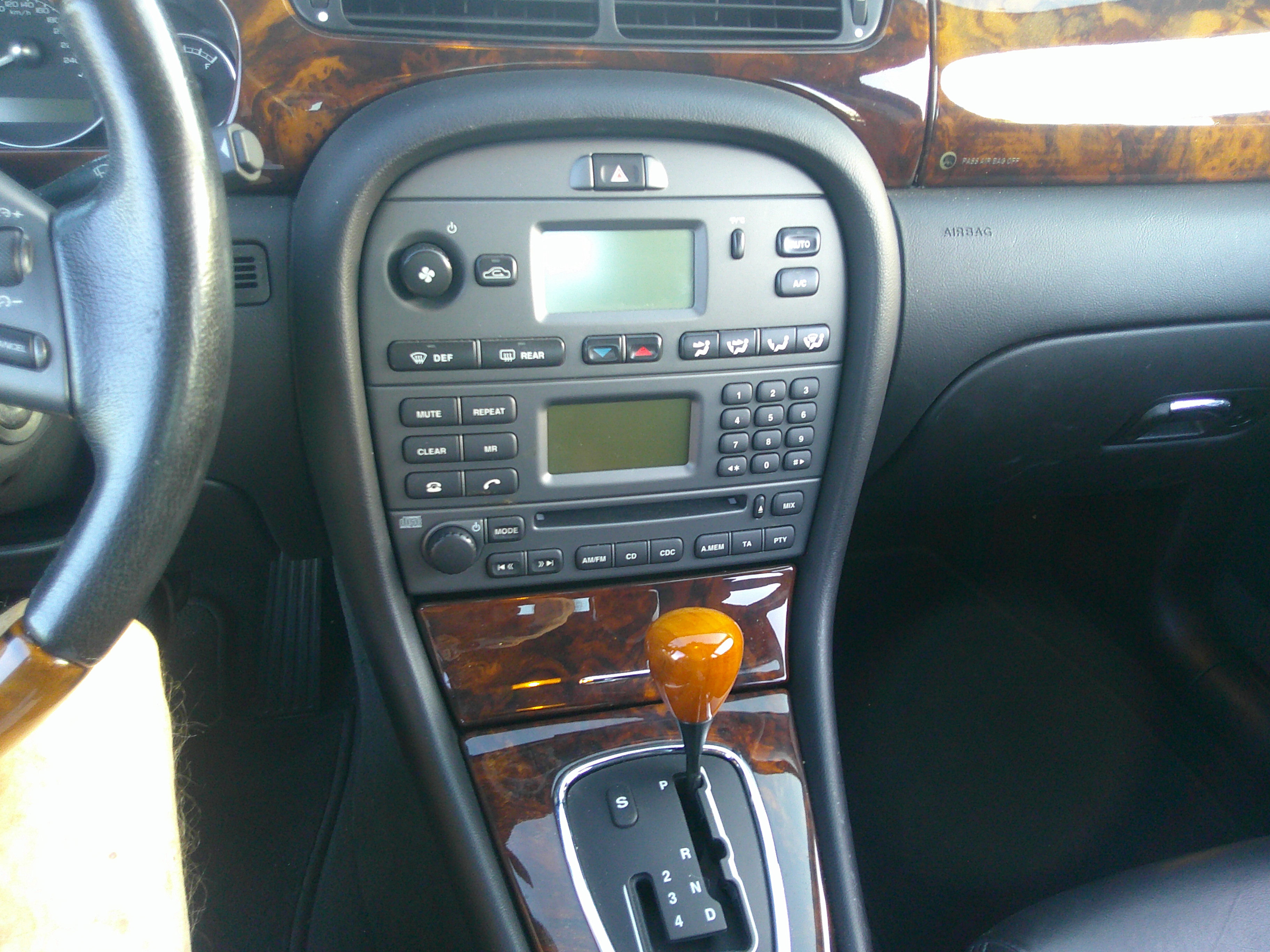 Center console with gear selector and radio controls