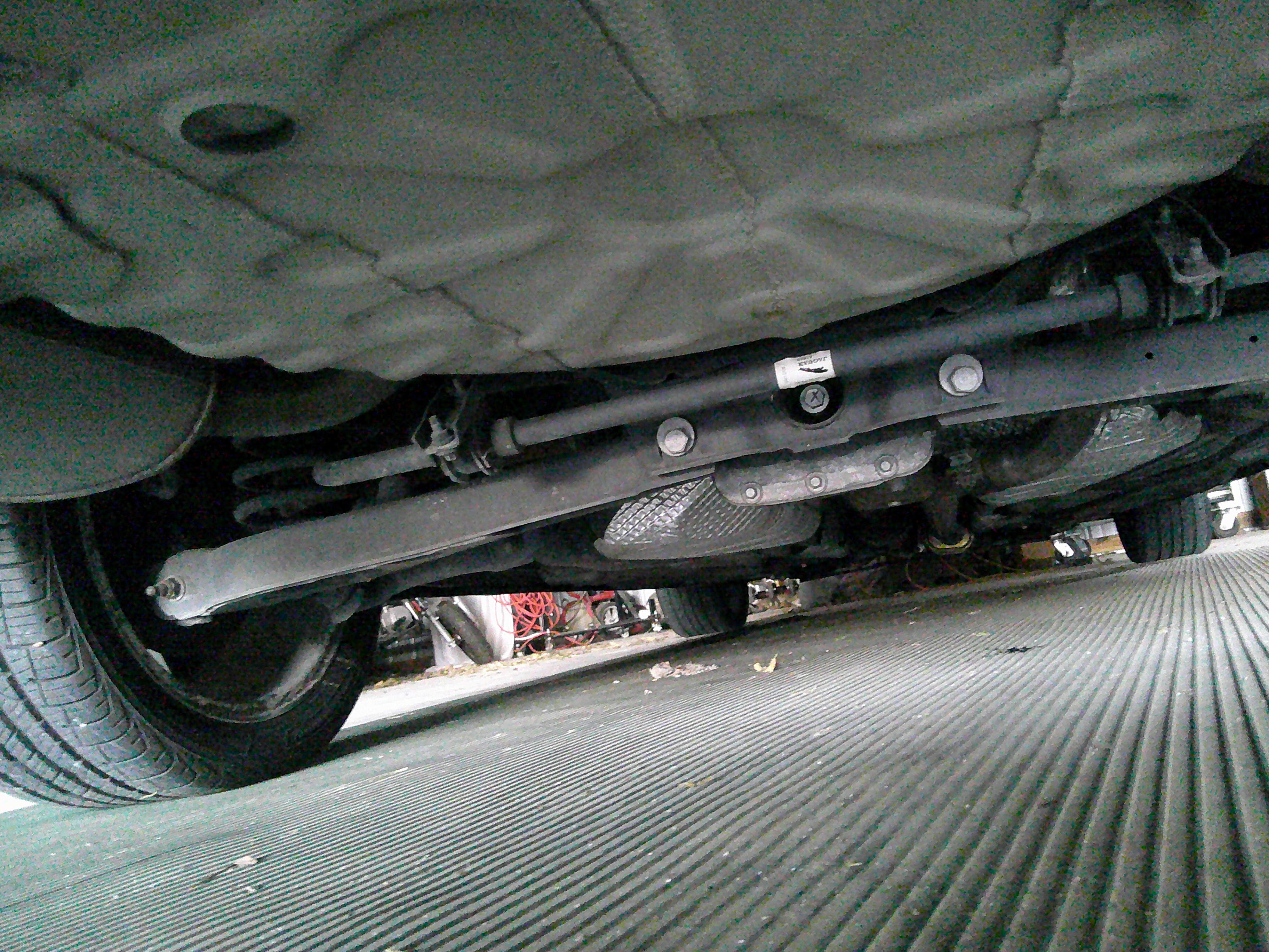 Rear suspension and chassis components viewed from underneath