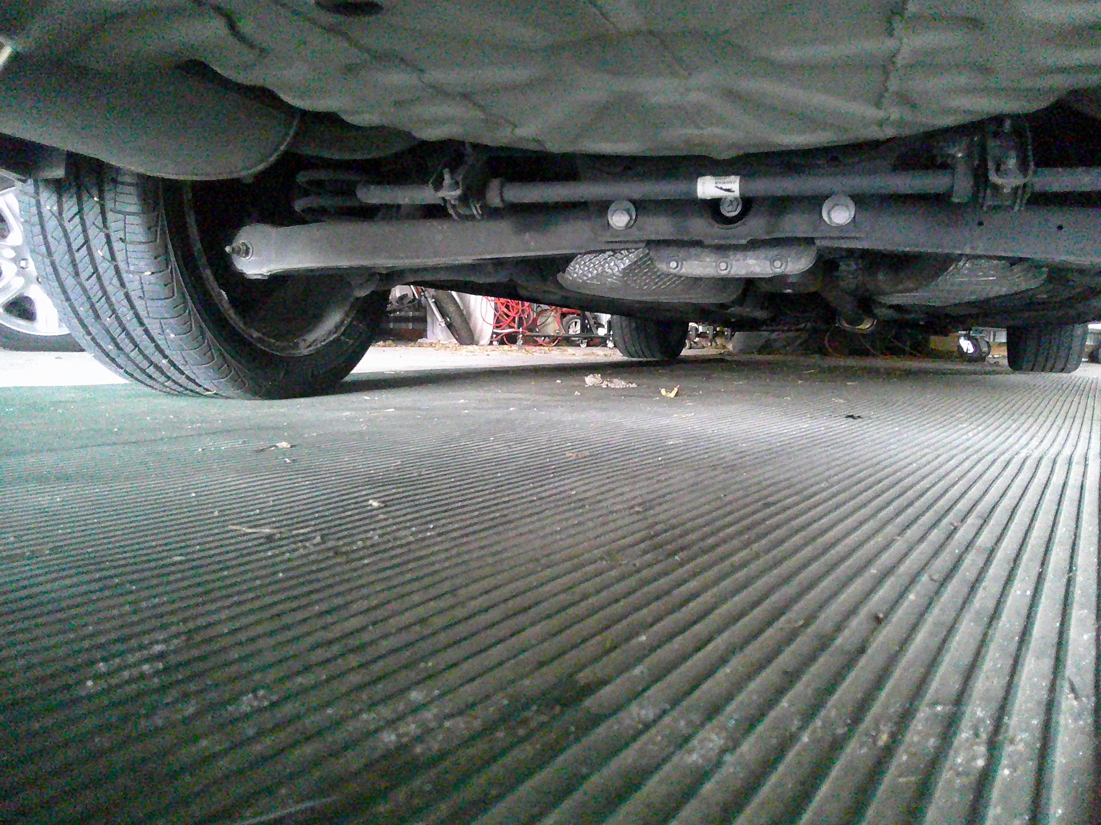 Underbody view showing rear suspension components and chassis