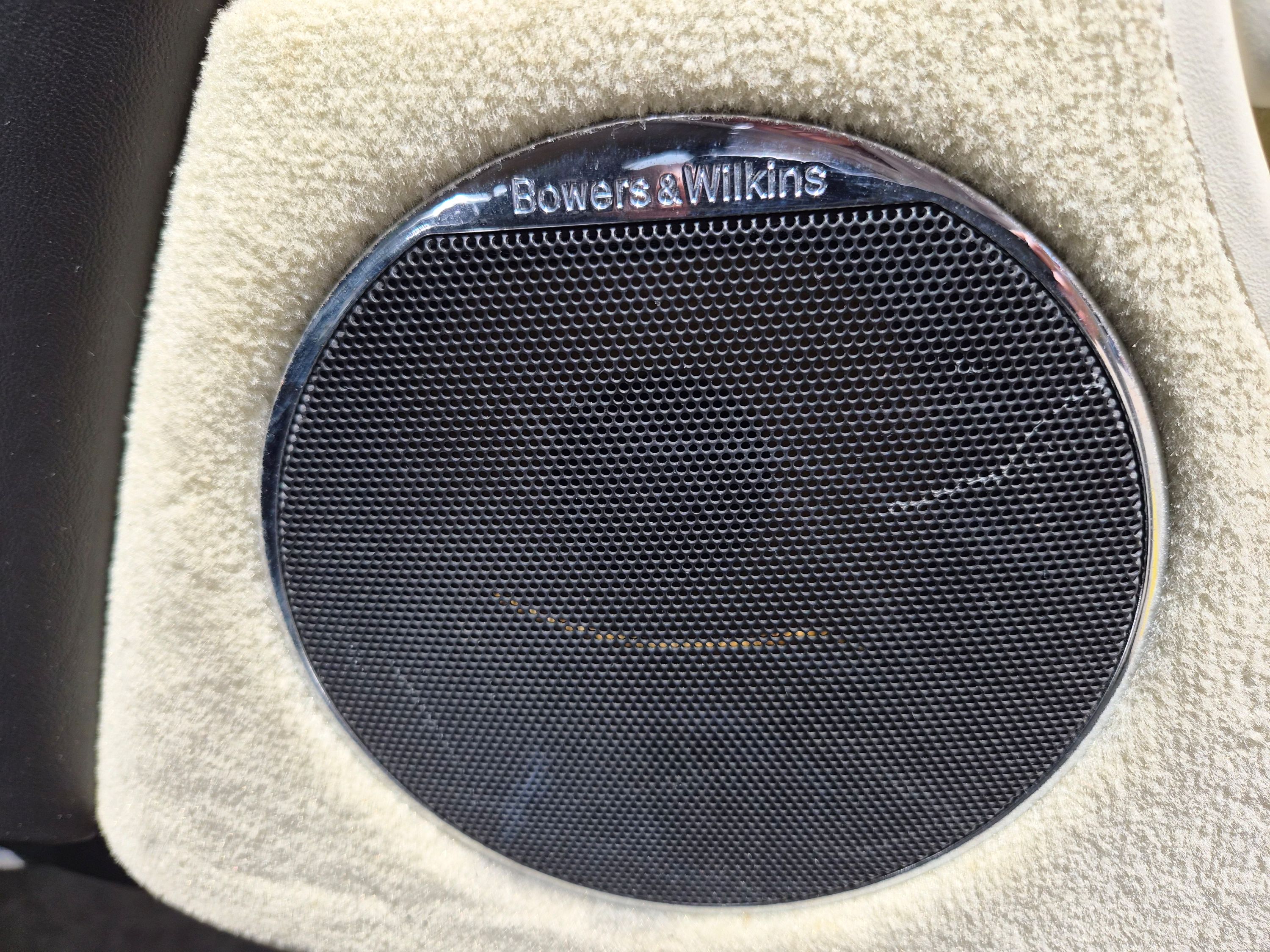 Bowers & Wilkins speaker and grille in car door panel