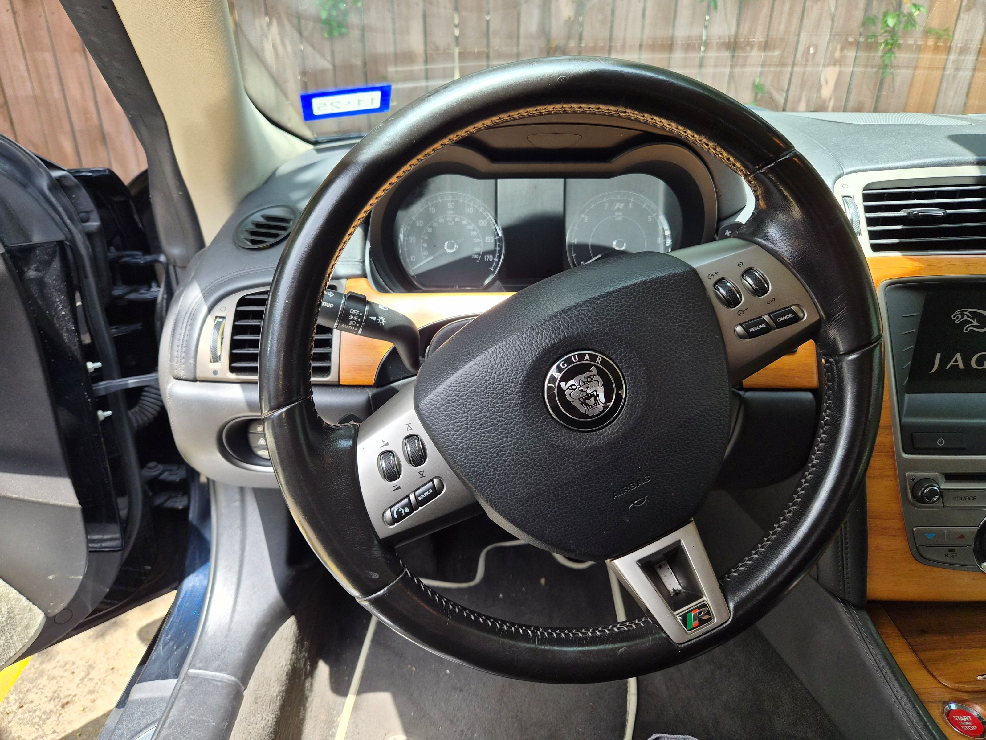 View of the multi-function steering wheel and instrument cluster