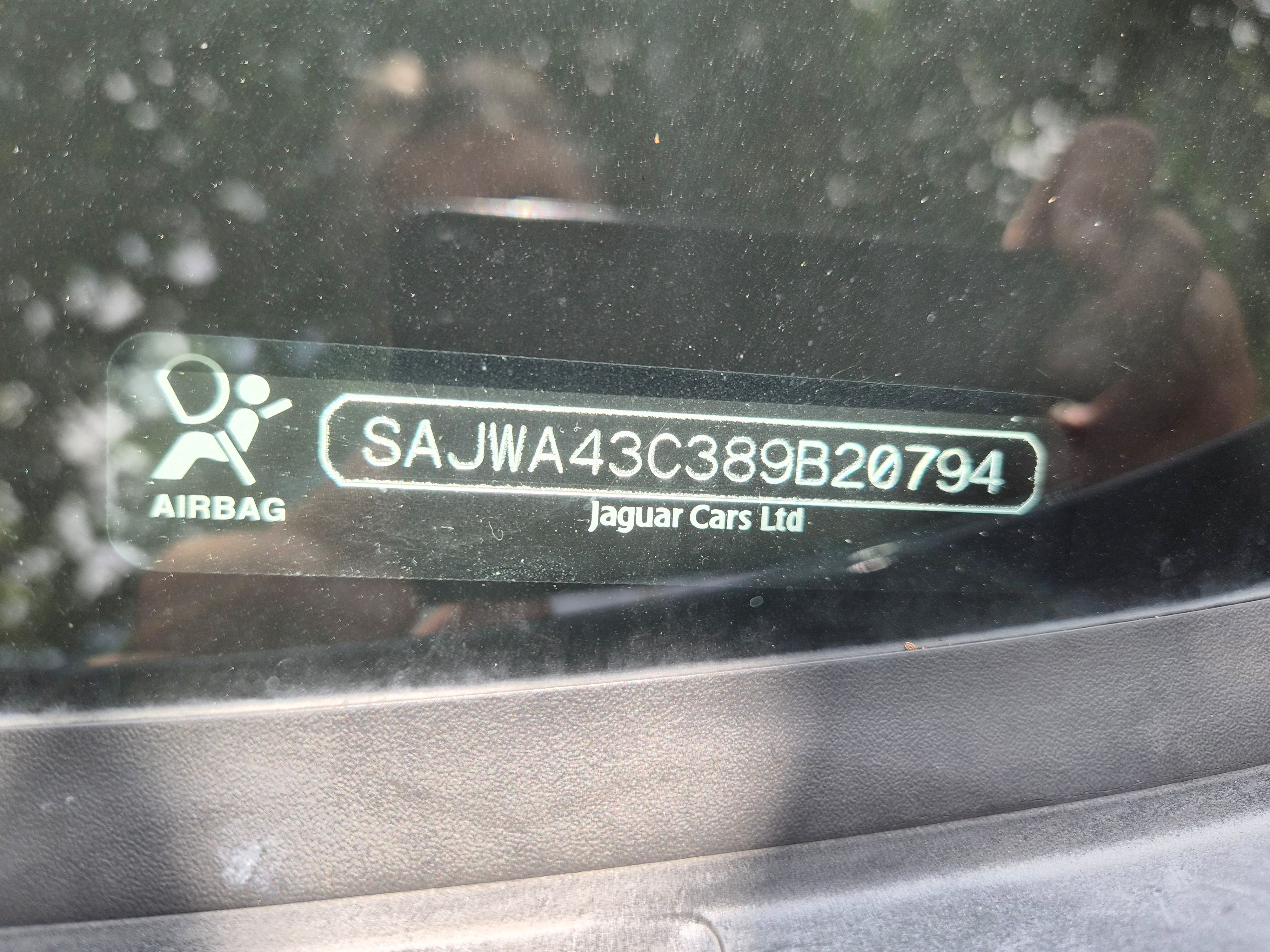 Vehicle identification number (VIN) displayed at the base of the windshield.