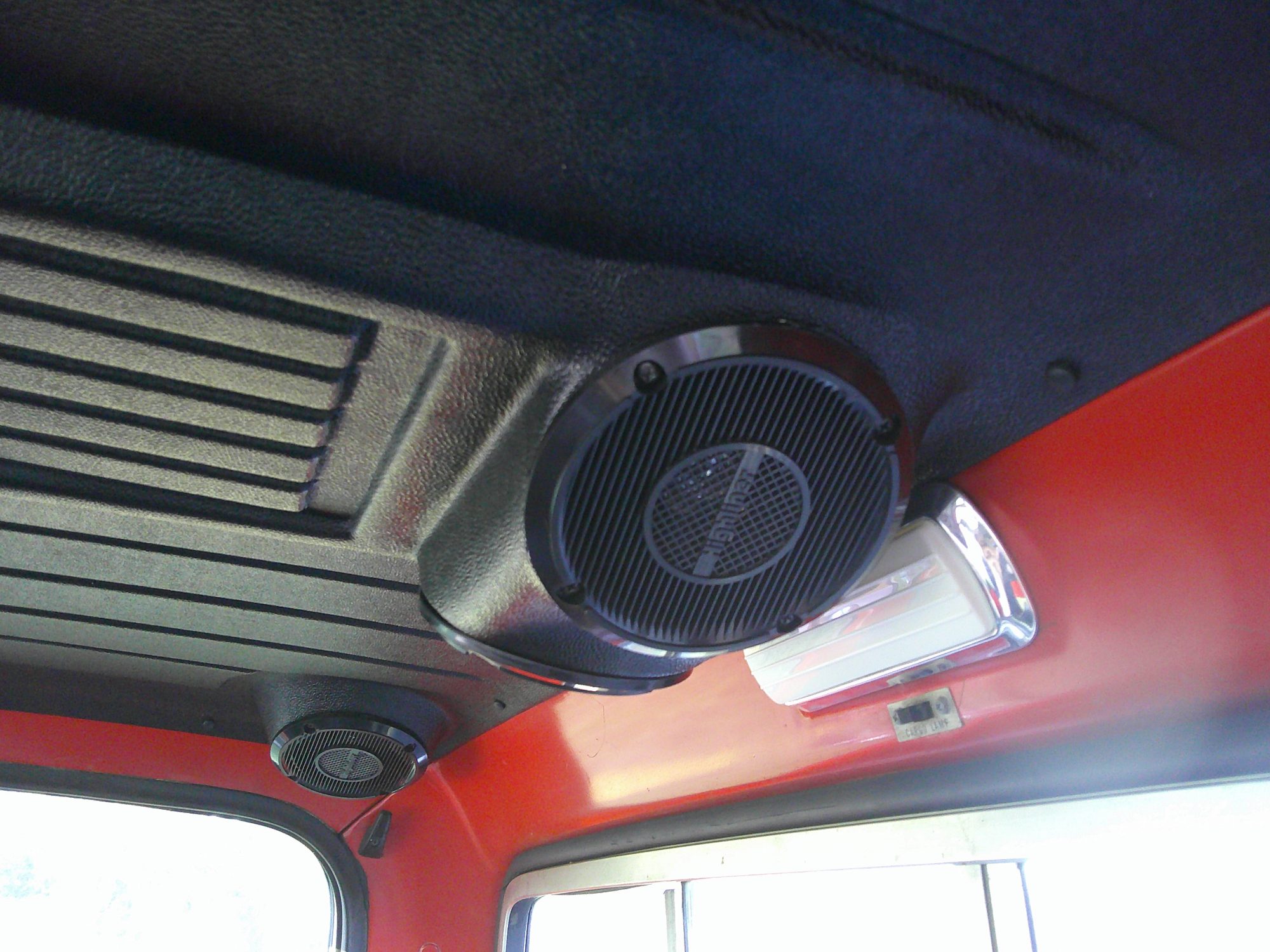 Custom overhead console featuring speakers and cargo lamp
